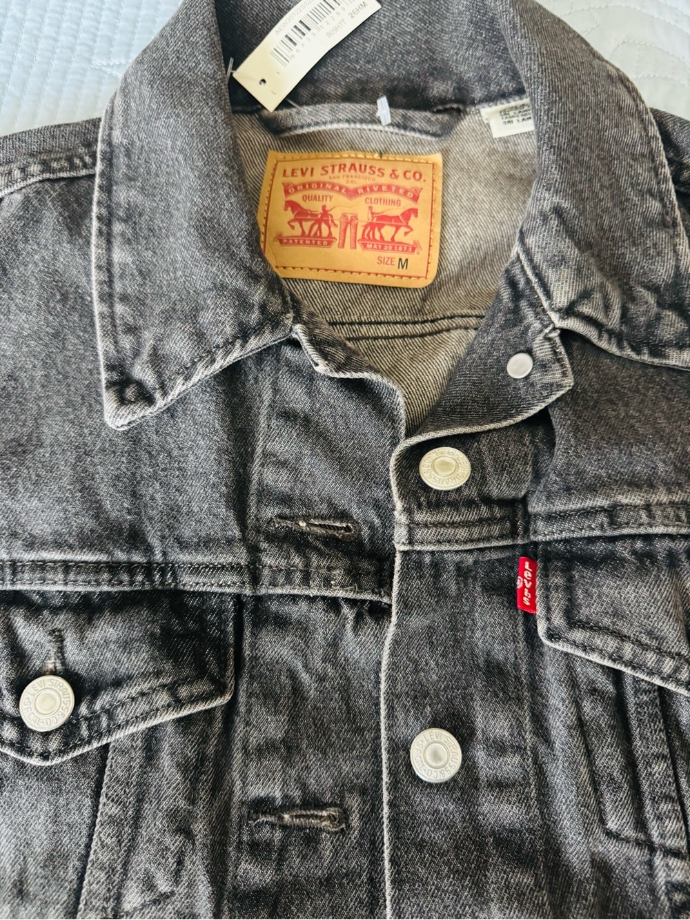 Levi's Washed Black Denim Jacket with Red Tab